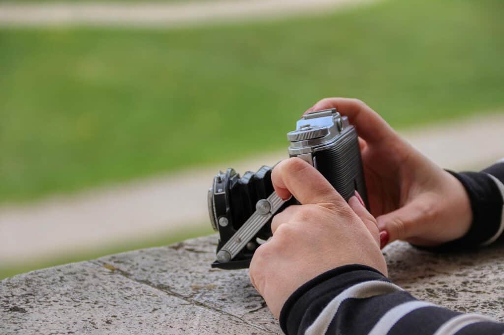 a person holding a camera